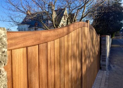 AES (SCOTLAND) LTD recently installed solid iroko tracked sliding gate in Gullane