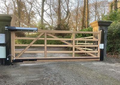 AES (Scotland) Ltd recently installed Iroko five bar automatic swing gate in Kirkliston