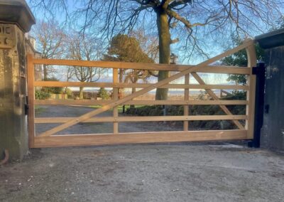 AES (Scotland) Ltd recently installed Iroko five bar automatic swing gate in Kirkliston