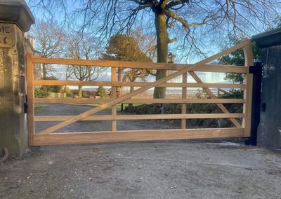 AES (Scotland) Ltd recently installed Iroko five bar automatic swing gate in Kirkliston