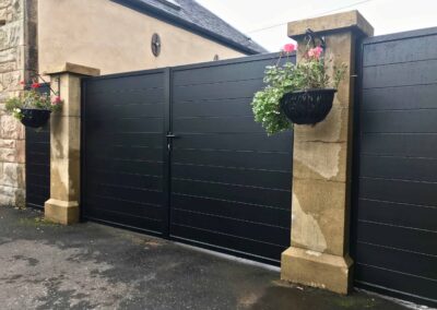 Aluminium manual driveway gates with matching side panels installed Linlithgow