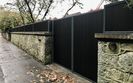 AES (SCOTLAND) LTD recently installed automatic and manual composite driveway gates with matching wall top panels Edinburgh.