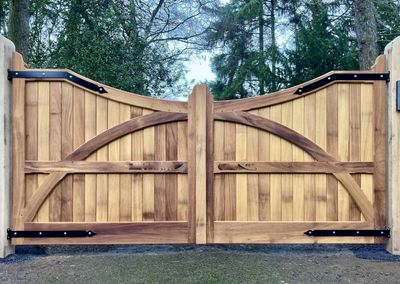 AES (SCOTLAND) LTD recently installed automatic Iroko gates hung from Oak posts Edinburgh
