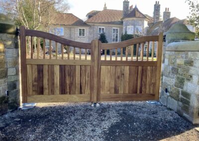 AES (SCOTLAND) LTD newly installed Iroko driveway gates, using client's existing automation. ‍‍‍‍‍‍