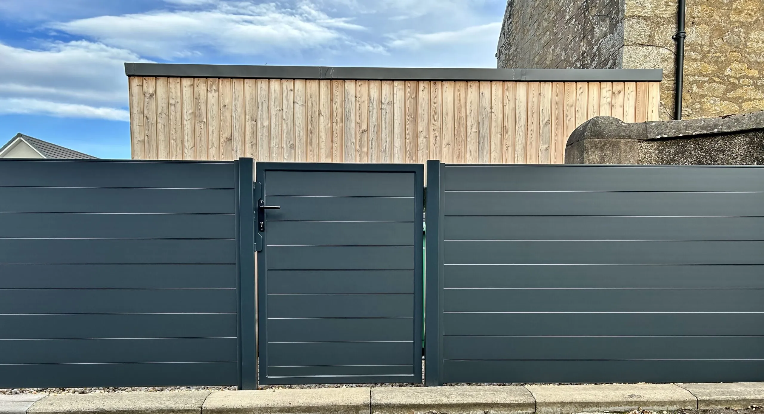 Aluminium pedestrian gate with matching fencing panels installed in Fife