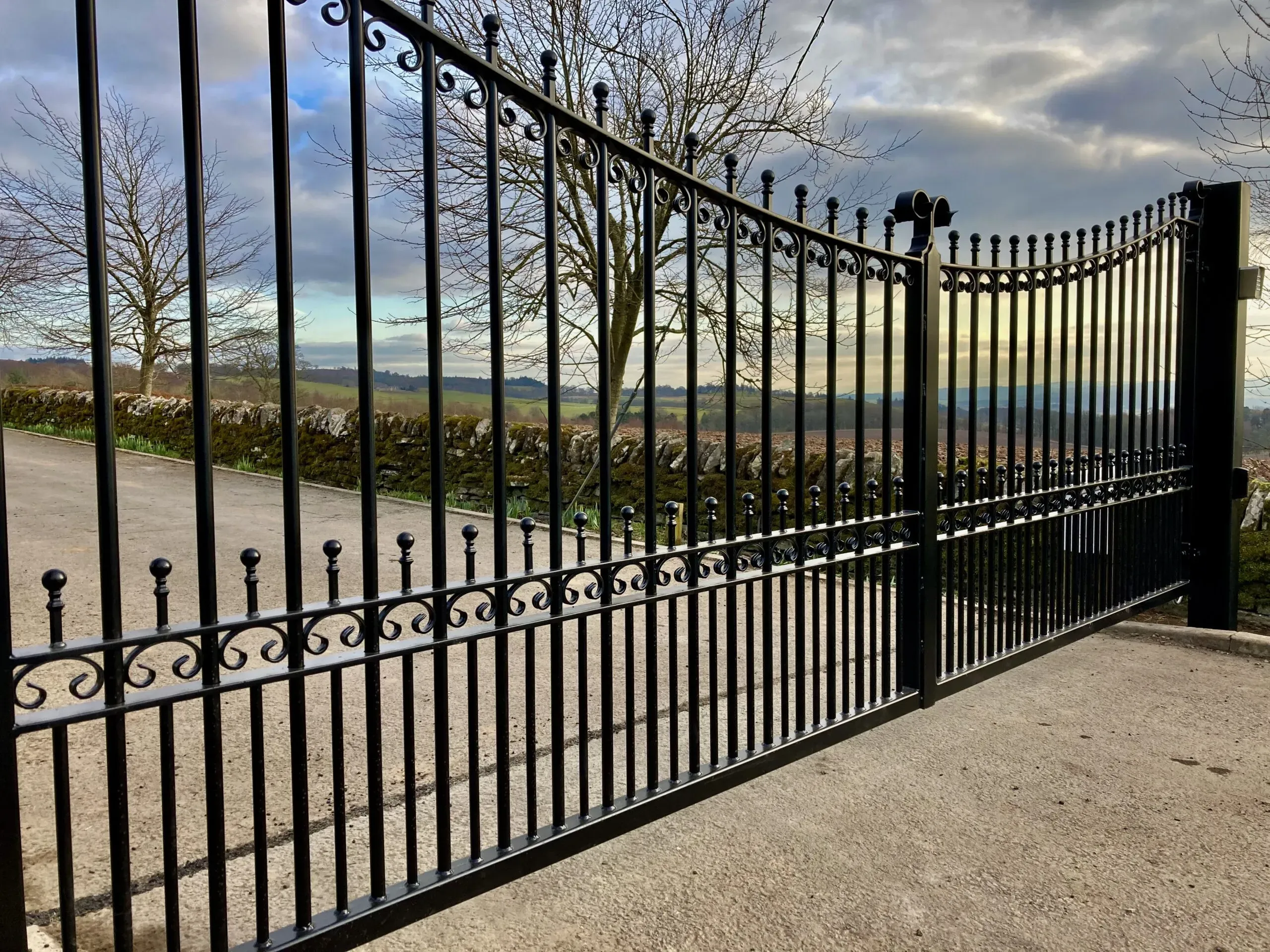 Large single leaf automatic wrought iron swing gate installed at an estate in Dunblane  