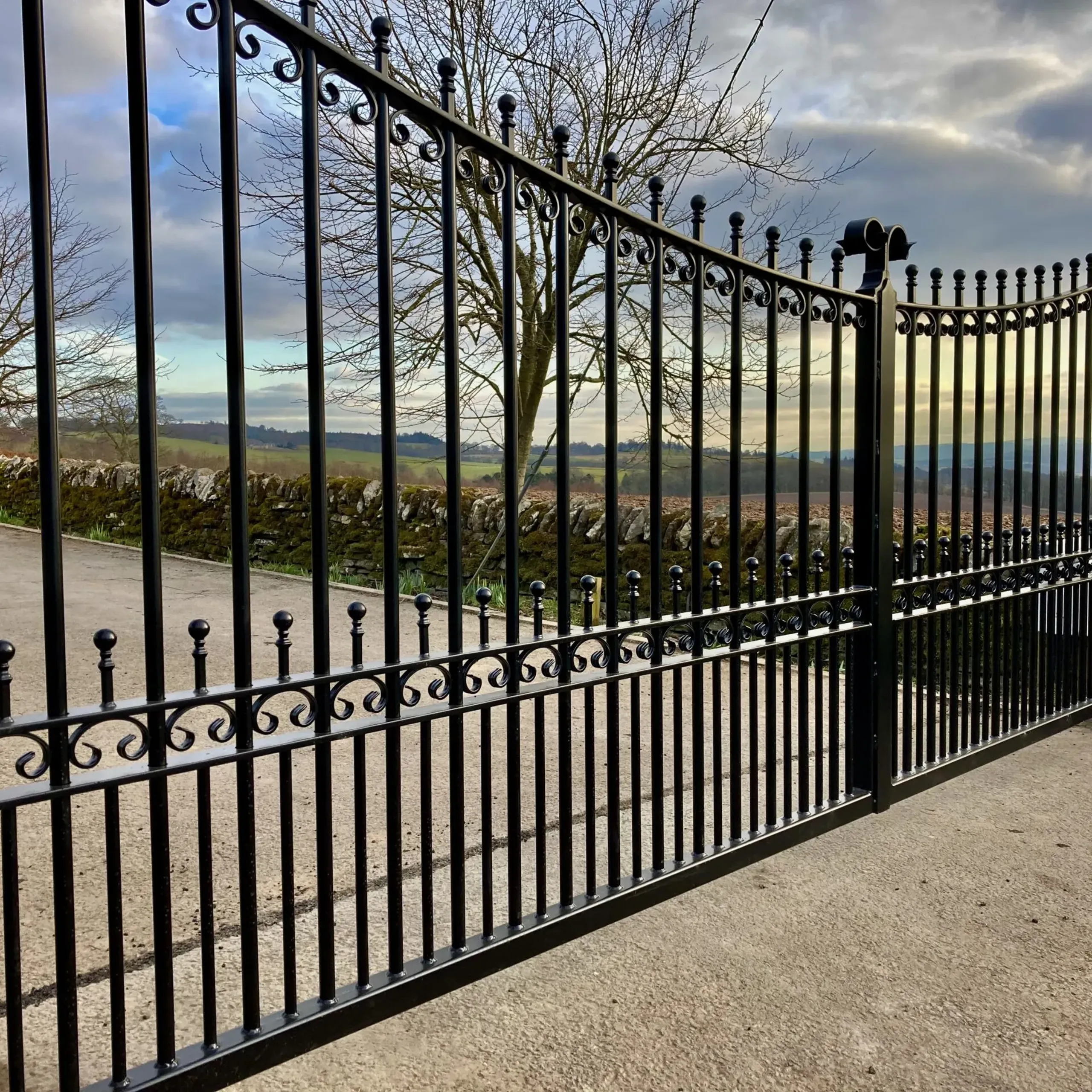 Large single leaf automatic wrought iron swing gate installed at an estate in Dunblane  