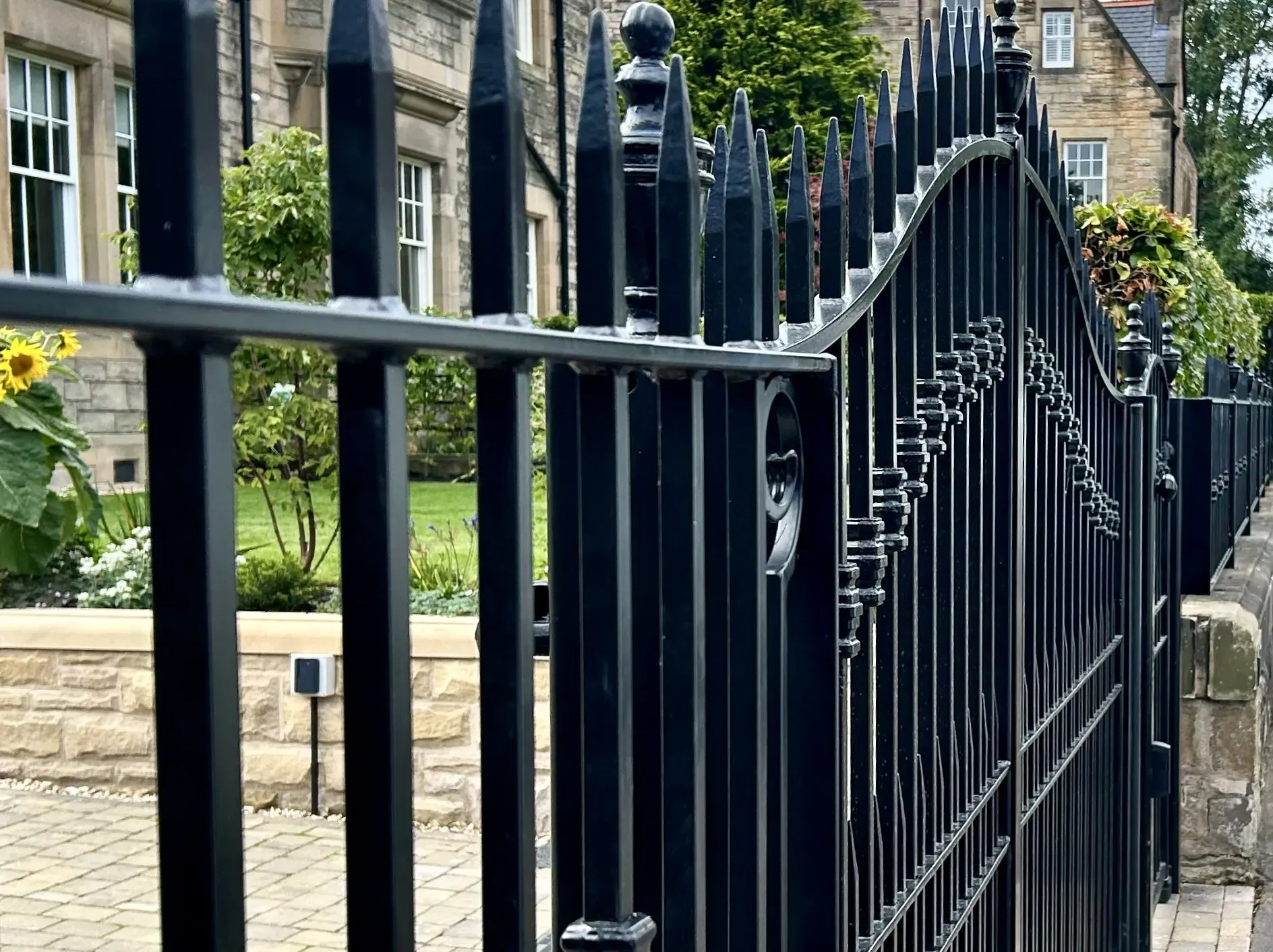 Automatic wrought iron gates with underground operators installed at a residential property in Edinburgh 