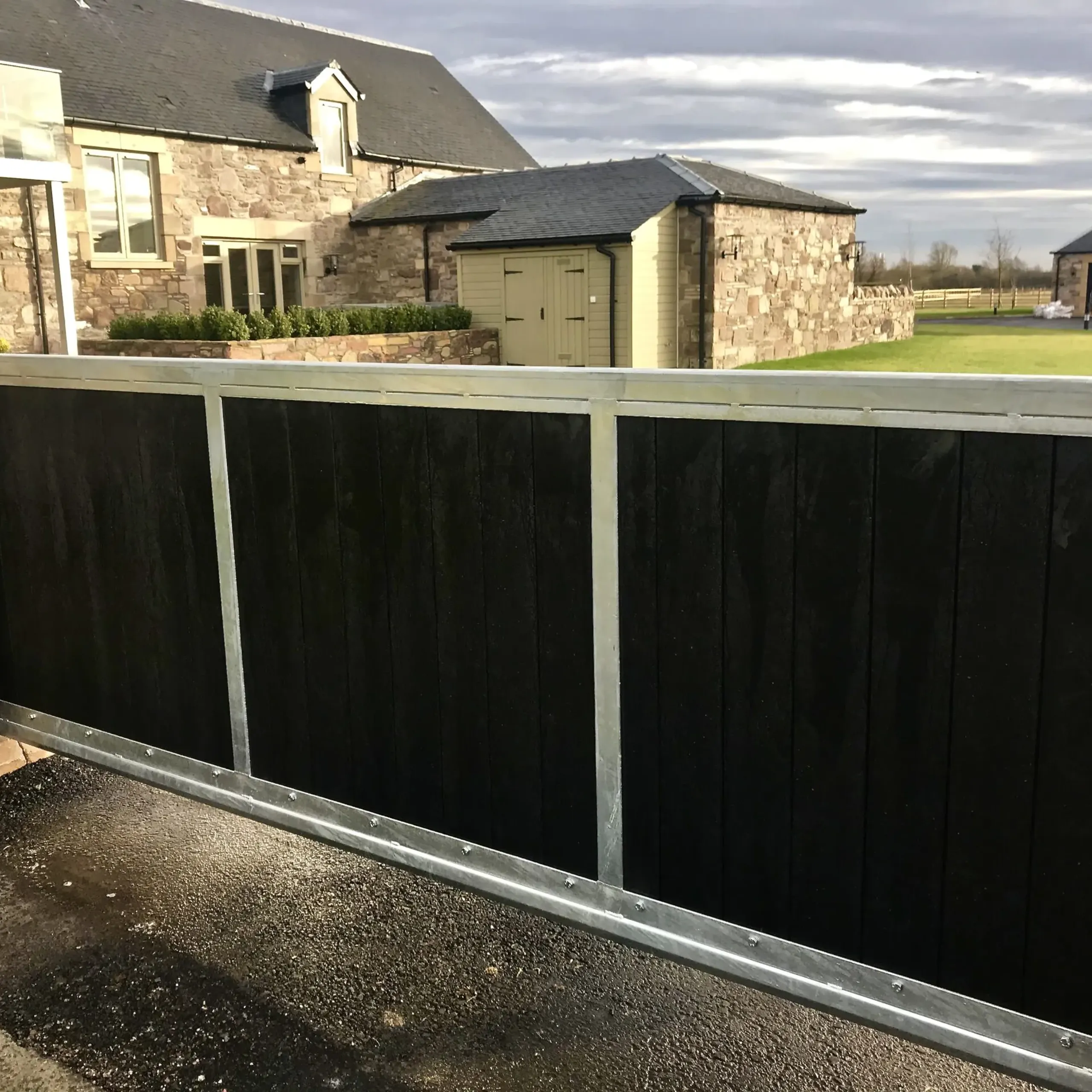 Automatic composite cantilever gate installed at a residential property in Bridge of Allan 