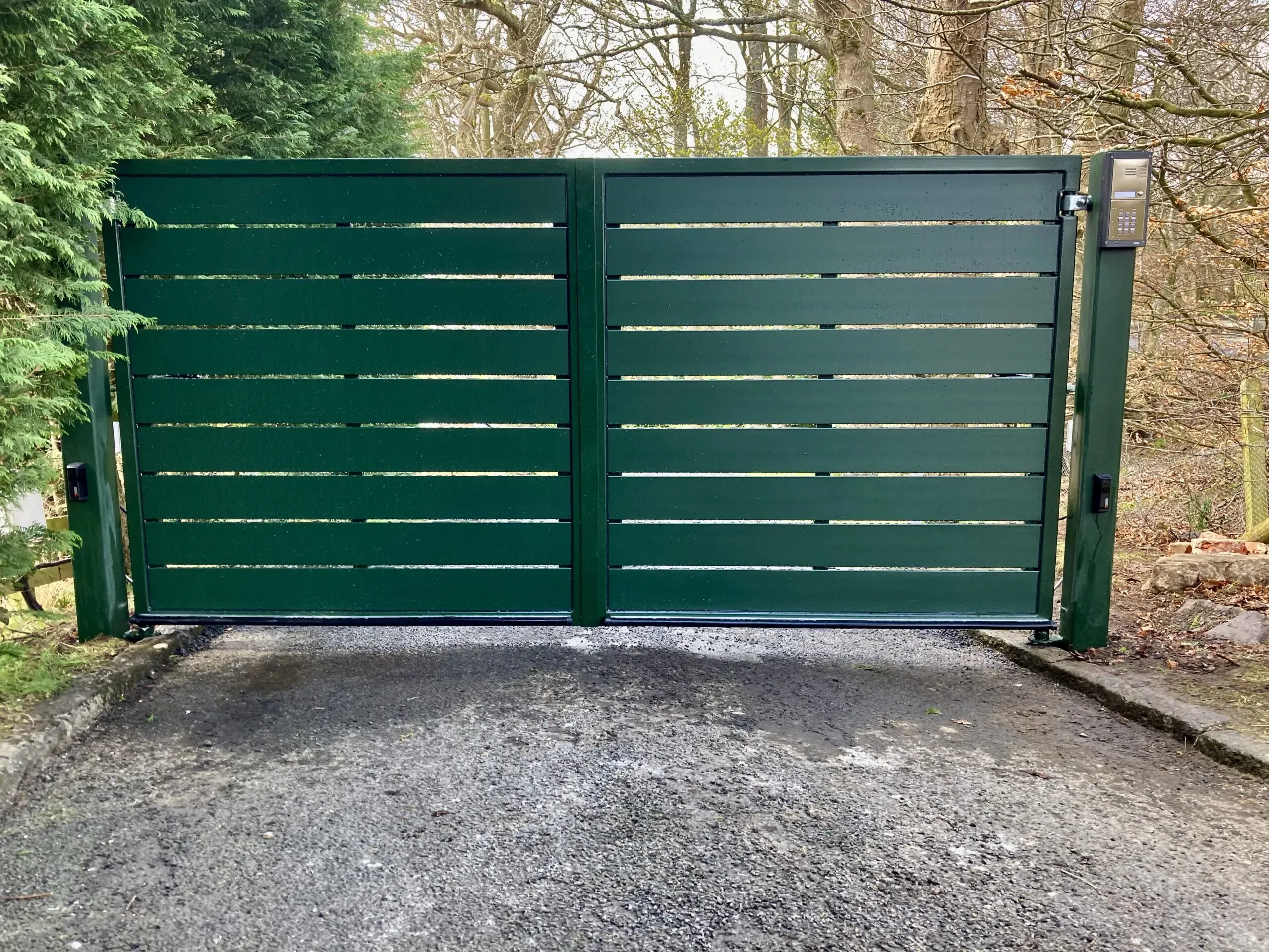 Pair of green aluminium electric swing gates installed in Balerno Scotland 