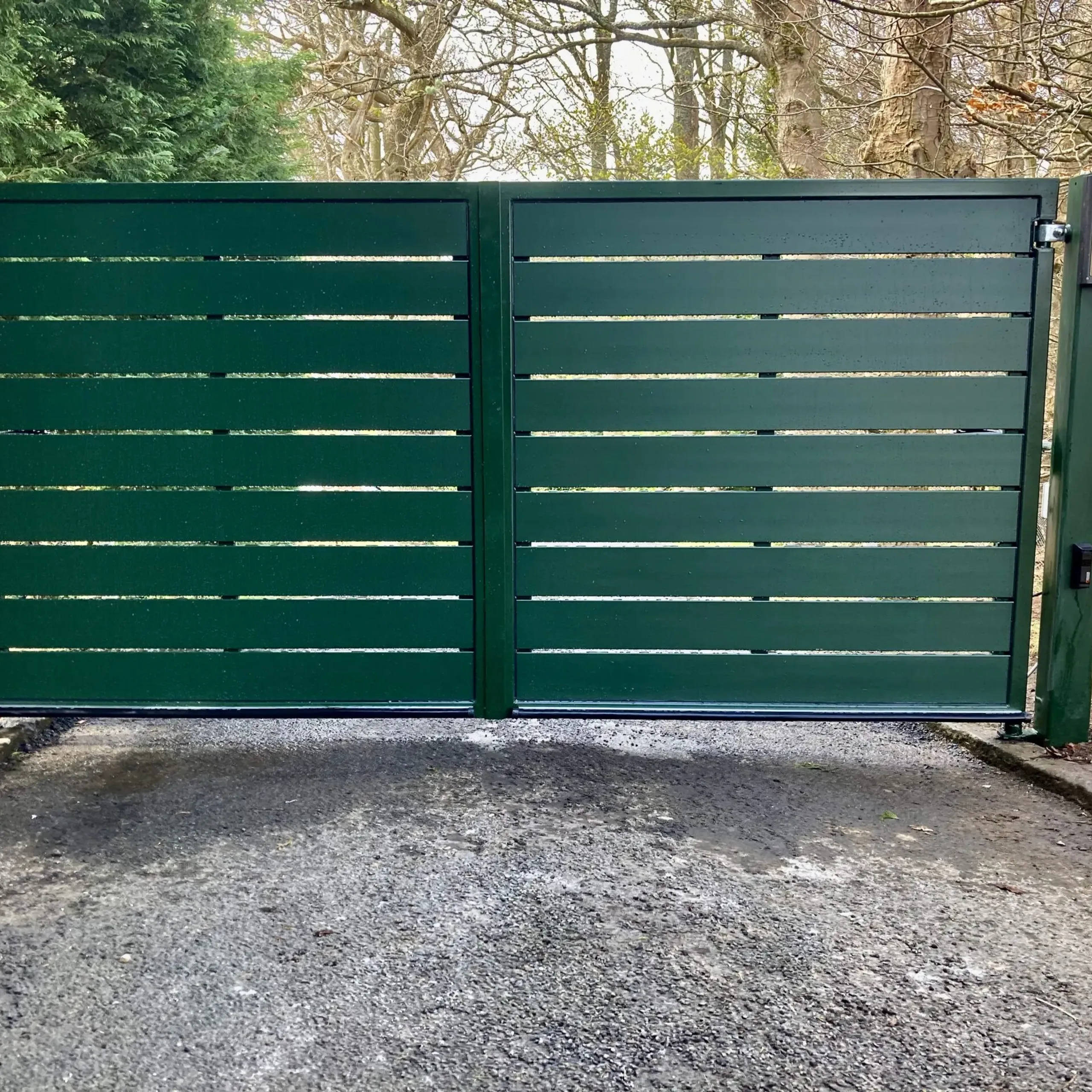 Pair of green aluminium electric swing gates installed in Balerno Scotland 
