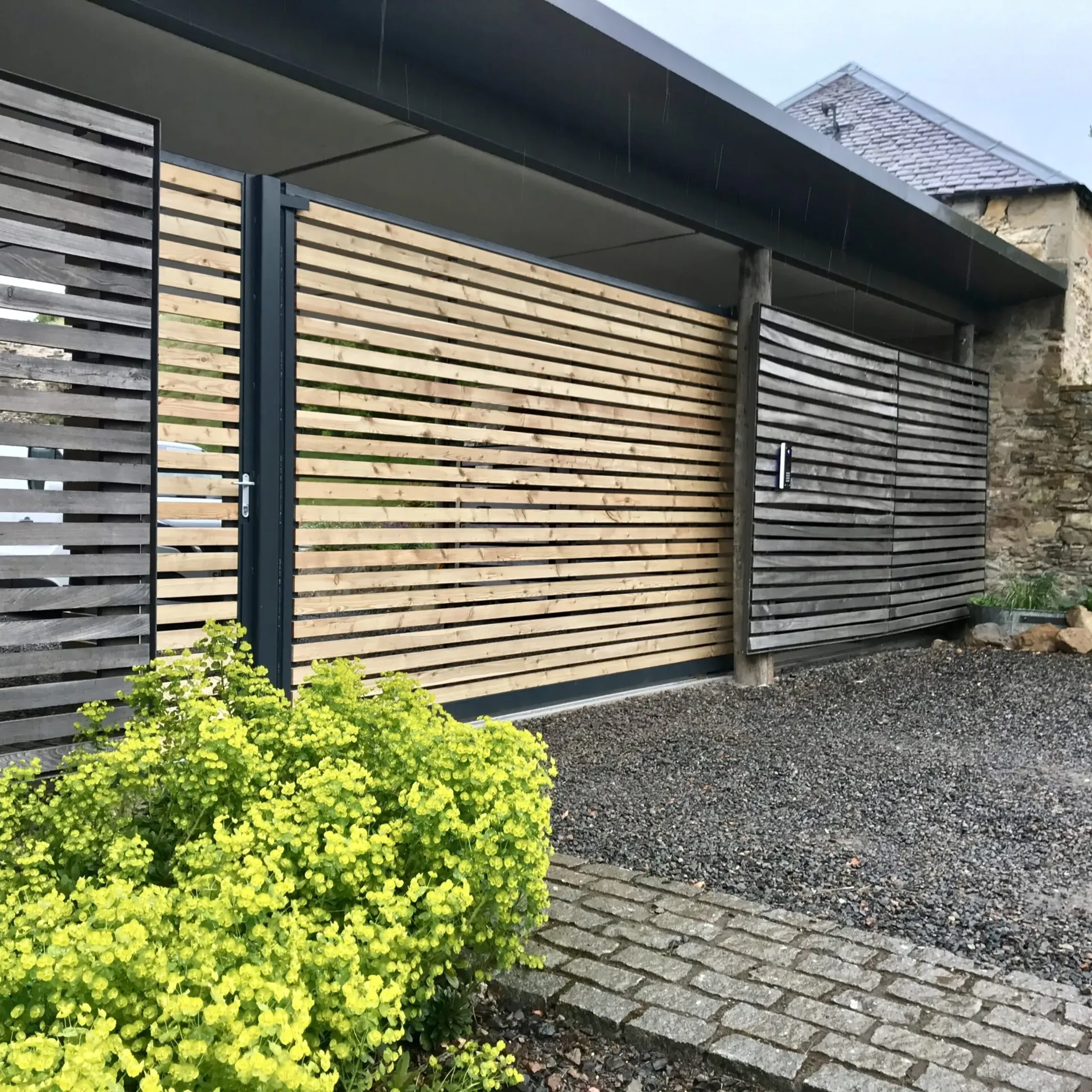 Electric gate servicing and repairs carried out on a tracked sliding gate in Edinburgh 
