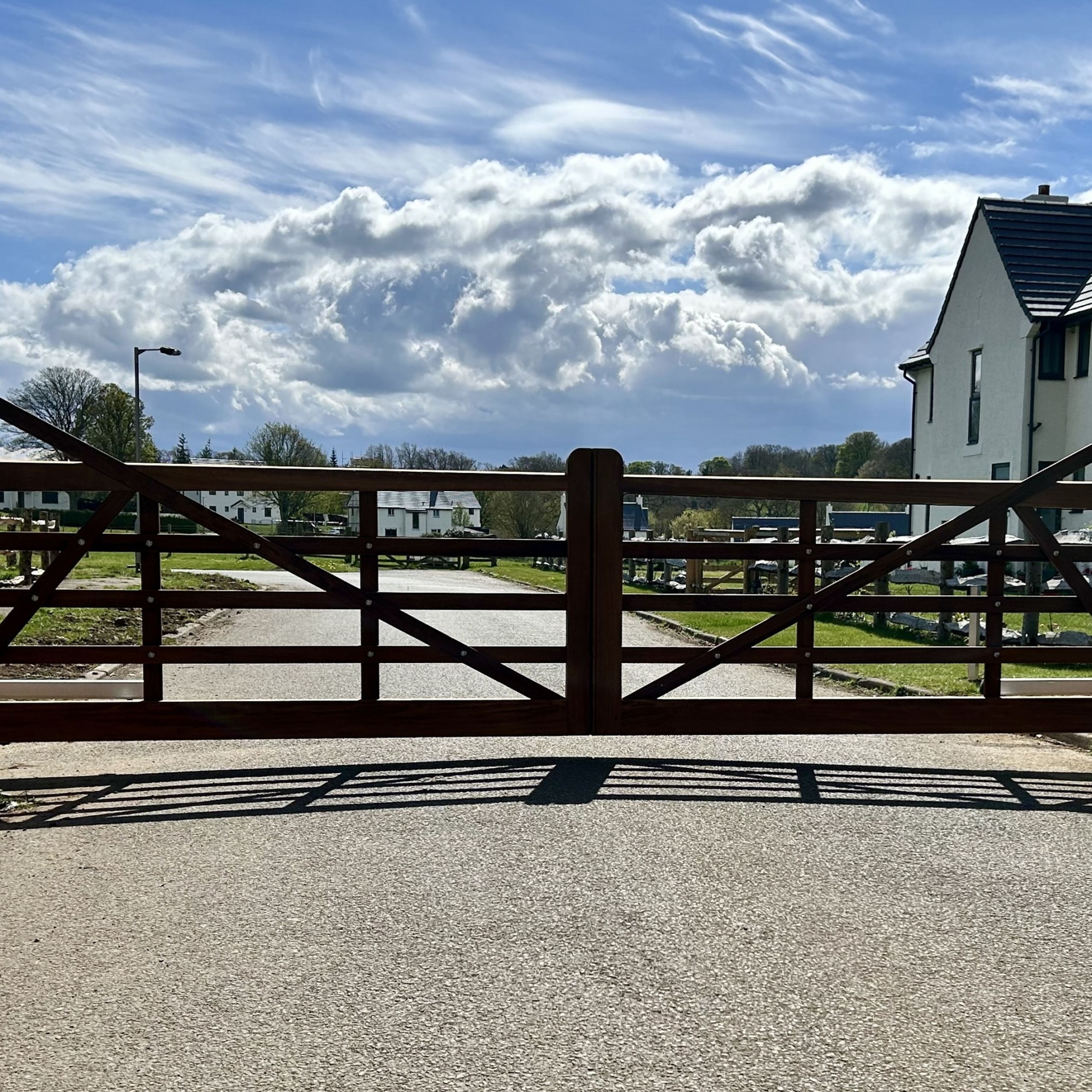Electric wooden 5 bar estate gates installed in Edinburgh.