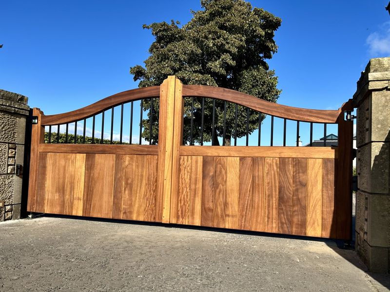 The Art of the Entrance: Bespoke Automatic Iroko Driveway Gates in Fife